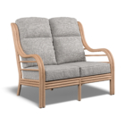 The Monza Sofa boasts a simple, curved design.